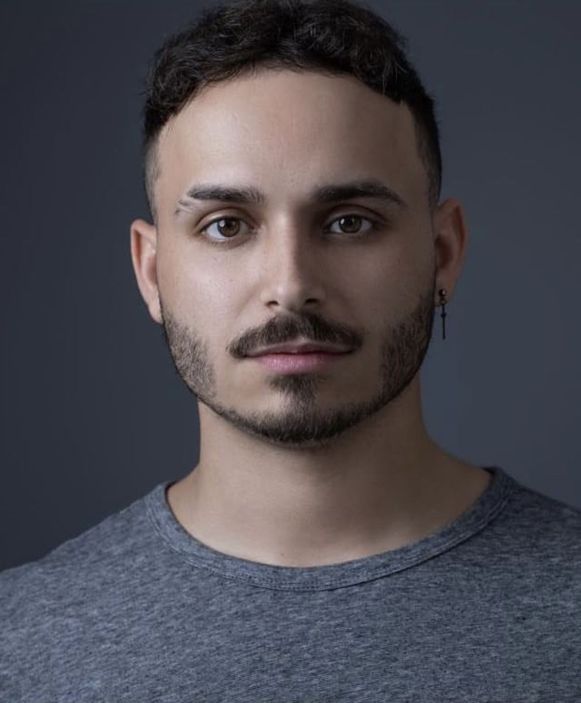 Professional headshot of Elijah Solis