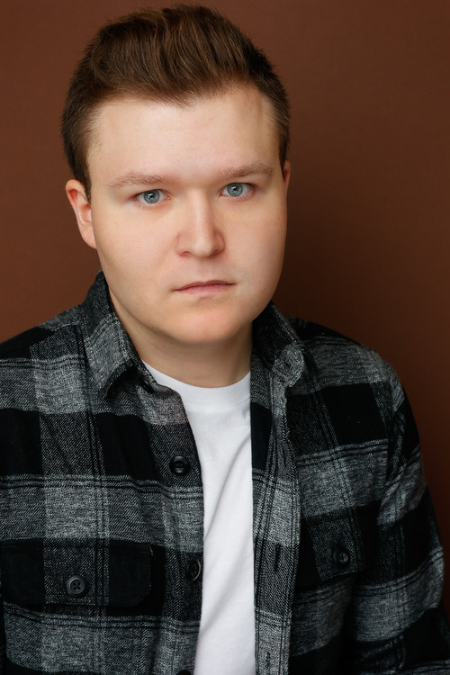 Professional headshot of Joseph Huebner
