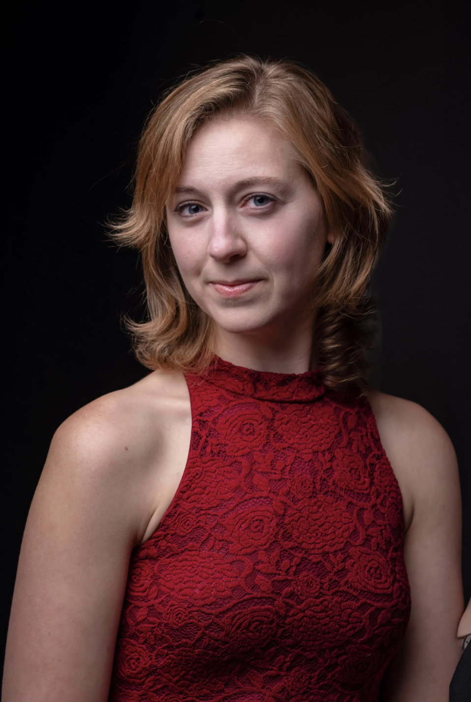 Professional headshot of Ashley Kay